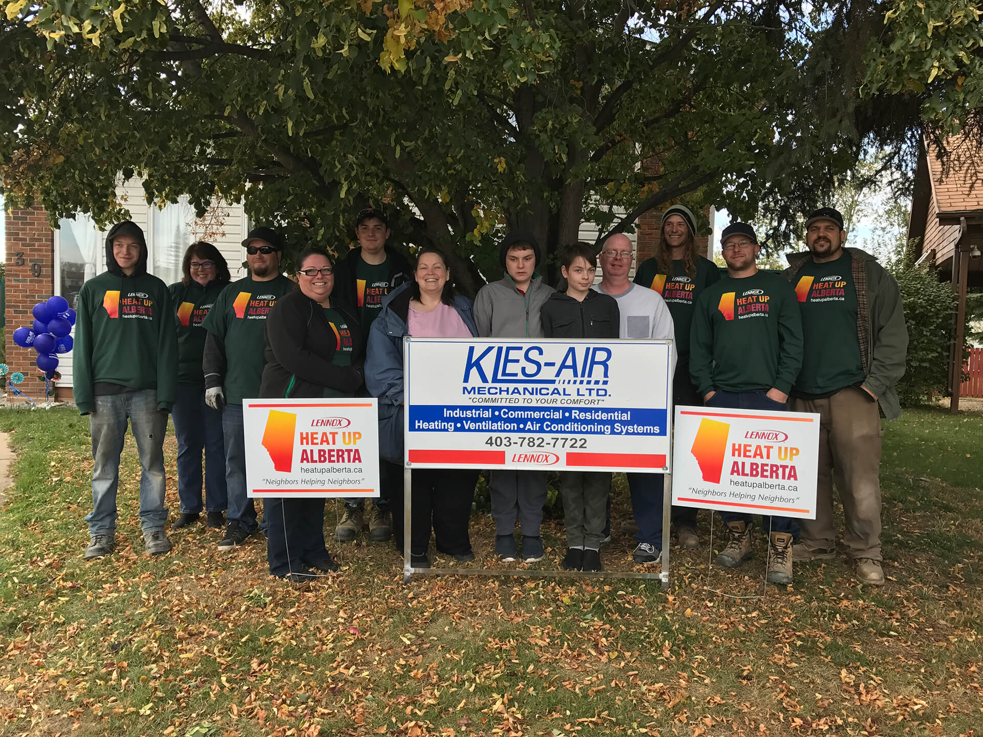 KlesAir Heat Up Alberta family pictured with Volunteers